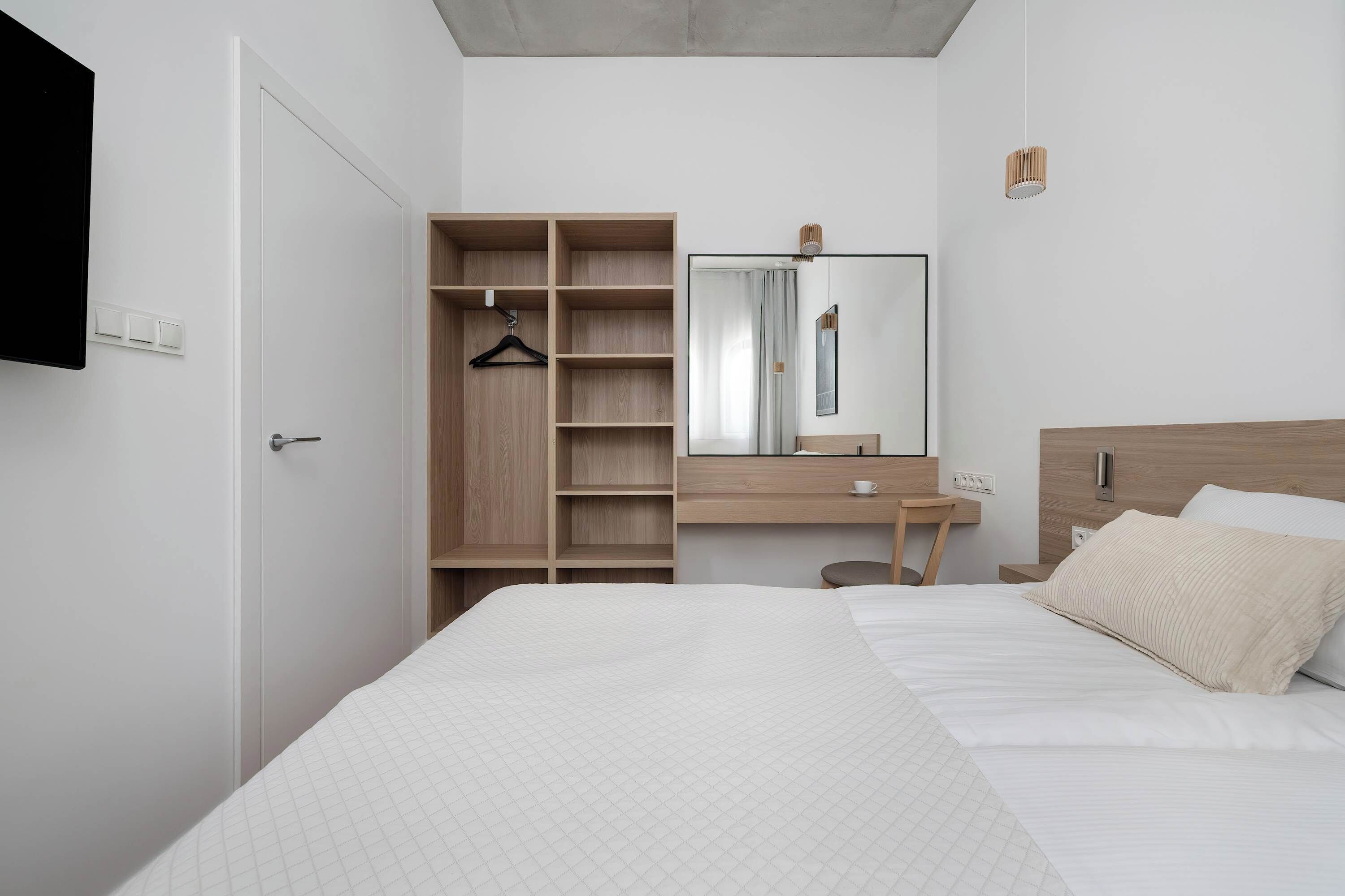 1 bedroom, desk, iron/ironing board, travel crib