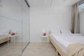 1 bedroom, desk, iron/ironing board, travel cot