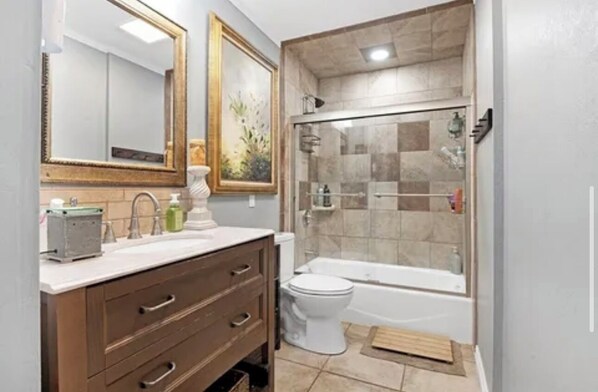 Hair dryer, towels, soap, shampoo