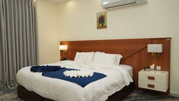Superior Apartment, City View | In-room safe, desk, laptop workspace, blackout drapes