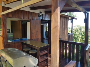 Property grounds - Cozy wooden cabin with every comfort and a view of the nearby golf course. (Jicaral)