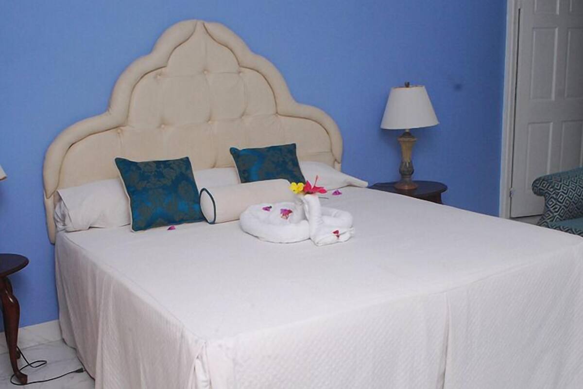 Standard Studio Suite, Partial Ocean View | Desk, blackout drapes, iron/ironing board, free WiFi