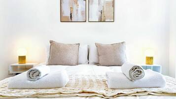 Iron/ironing board, travel crib, WiFi, bed sheets