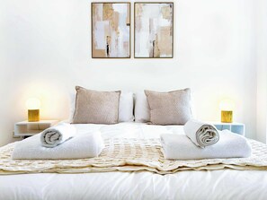 Iron/ironing board, travel crib, WiFi, bed sheets