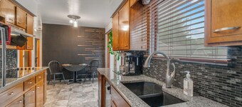 Welcoming 2-bedroom home with large deck and central location.