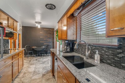 Welcoming 2-bedroom home with large deck and central location.