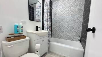 Hair dryer, bidet, towels, soap