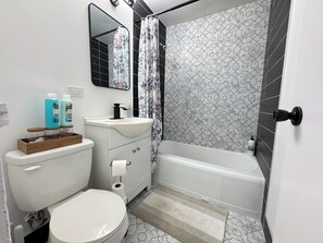 Hair dryer, bidet, towels, soap