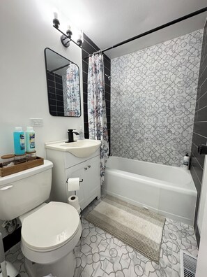 Hair dryer, bidet, towels, soap