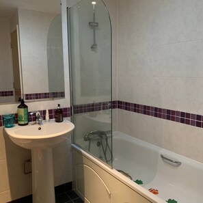 Shower, towels, toilet paper