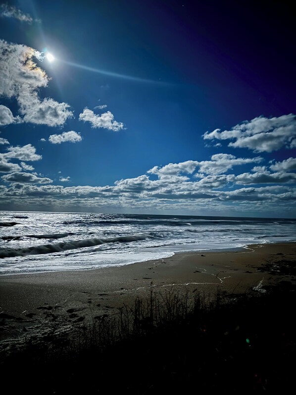 On the beach, sun loungers, beach towels