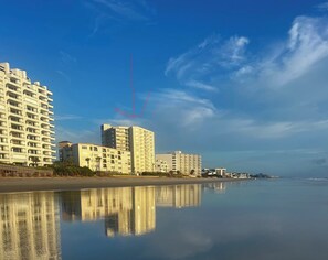 On the beach, sun loungers, beach towels