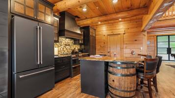 Cabin, Multiple Beds, Hot Tub, Garden View (Antler Summit Trio) | Private kitchen | Fridge, microwave, oven, stovetop