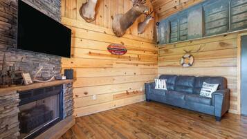 Cabin, 1 Queen Bed with Sofa bed, Hot Tub, Mountain View (Antlers Lodge) | Living area | 42-inch flat-screen TV with digital channels, fireplace