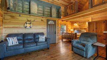 Cabin, 1 Queen Bed with Sofa bed, Hot Tub, Mountain View (Antlers Lodge) | Living area | 42-inch flat-screen TV with digital channels, fireplace