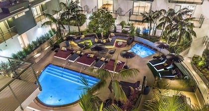 Chic Spacious Apt steps from Museum Row w/ Patio, Pool & Den