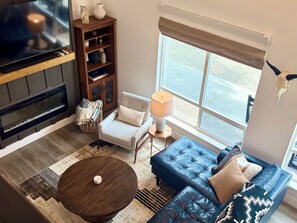 Smart TV, fireplace, books