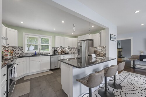 The Reel Retreat | Theatre & Firepit • Game Room