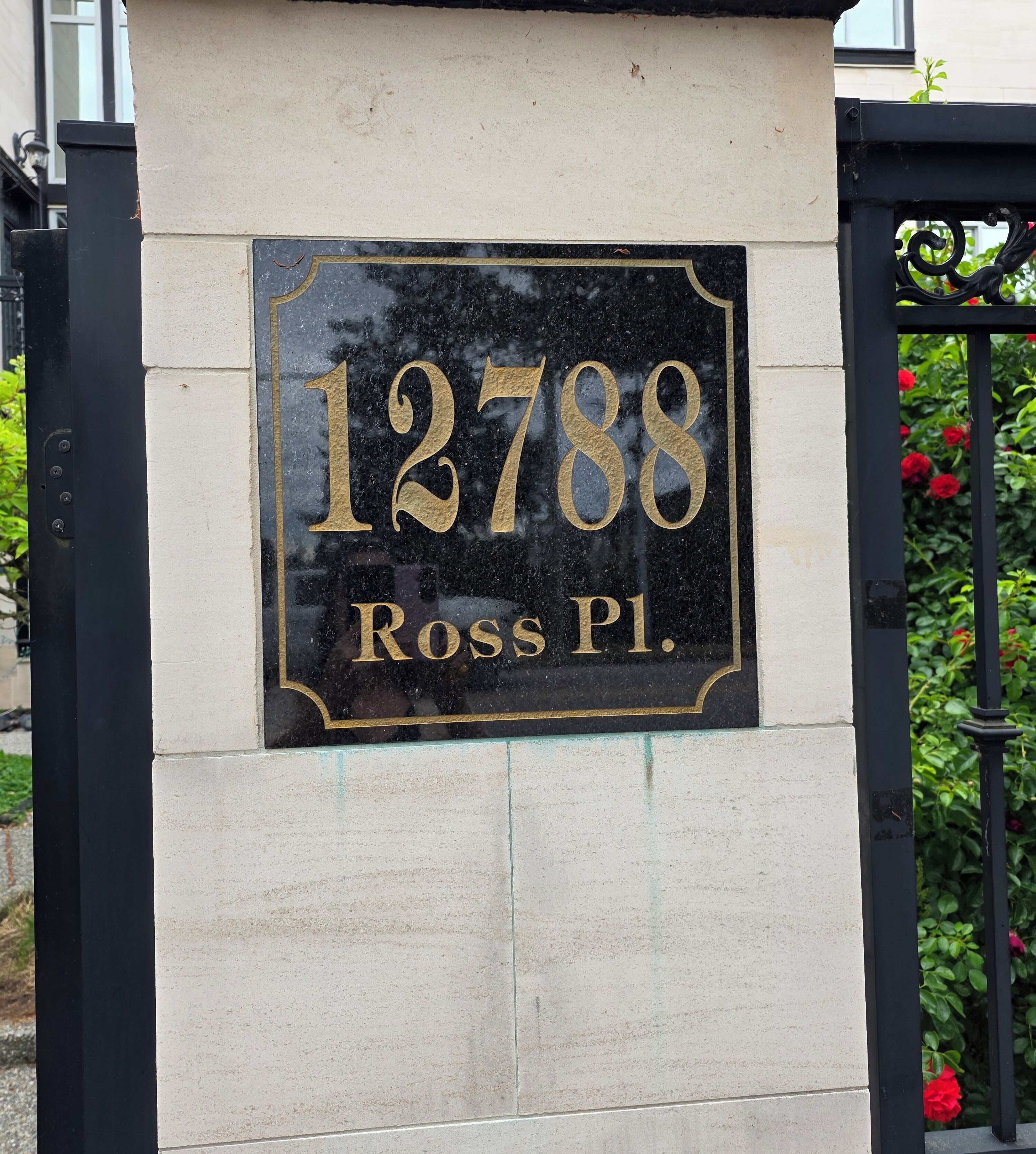 A house number sign with '12788 Ross Pl.'