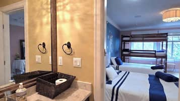 Family Suite, Multiple Beds, Microwave, Garden View | Premium bedding, desk, laptop workspace, blackout drapes