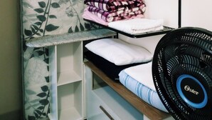 A bunk bed with a mattress on the top bunk and a fan on the bottom. - Valença Space - in the heart of the historic center (Centro Histórico Porto Alegre)