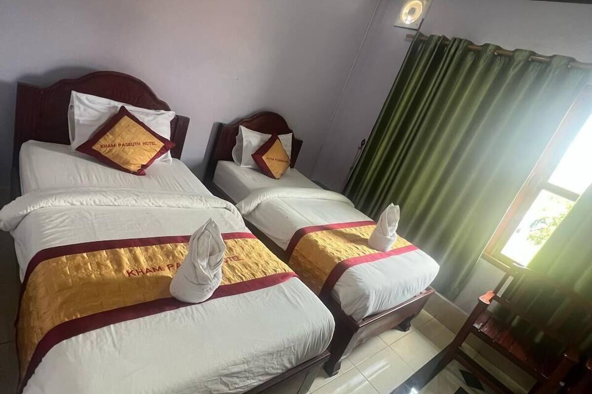 Double or Twin Room, City View | Desk, blackout drapes, iron/ironing board, free WiFi