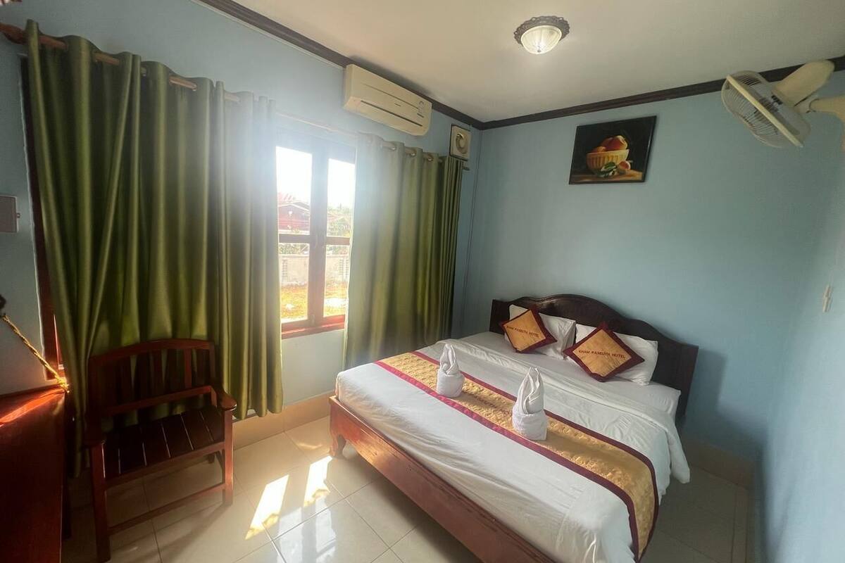 Double Room, City View | Desk, blackout drapes, iron/ironing board, free WiFi