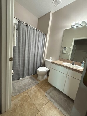 Hair dryer, towels, soap, toilet paper