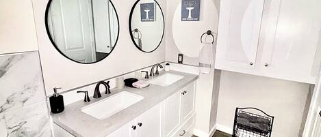 Hair dryer, towels, soap, shampoo
