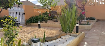 Villa grand confort de plain pied avec garage, parking, véranda terrasse.