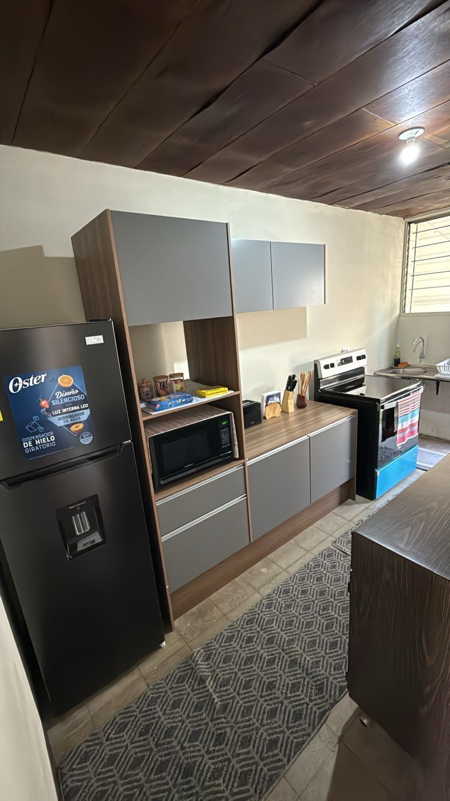 Coffee/tea maker, fridge, microwave, oven