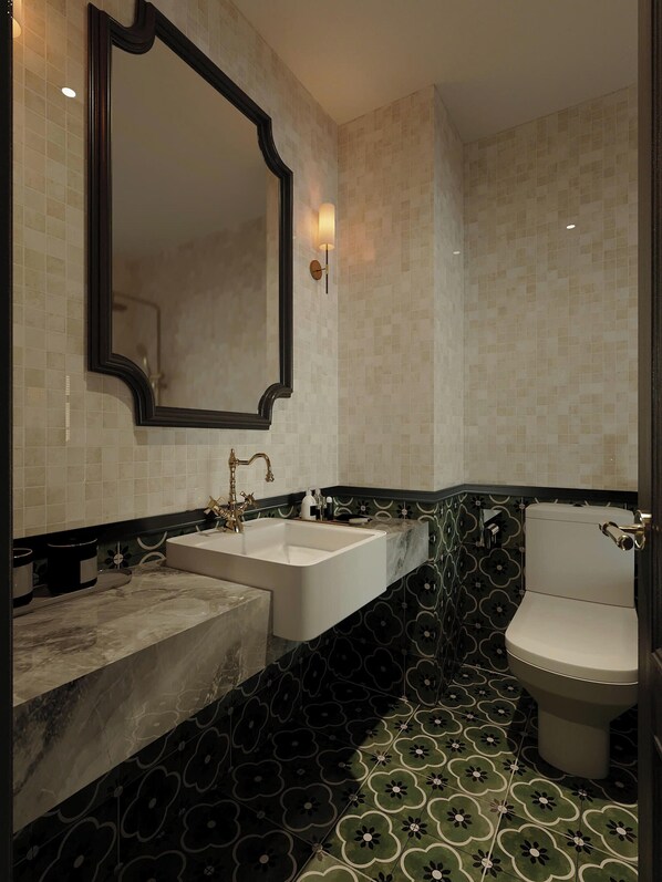A bathroom with two sinks, a toilet, and a large mirror. - L'Heritage Riverside Hoi An (Hoi An)