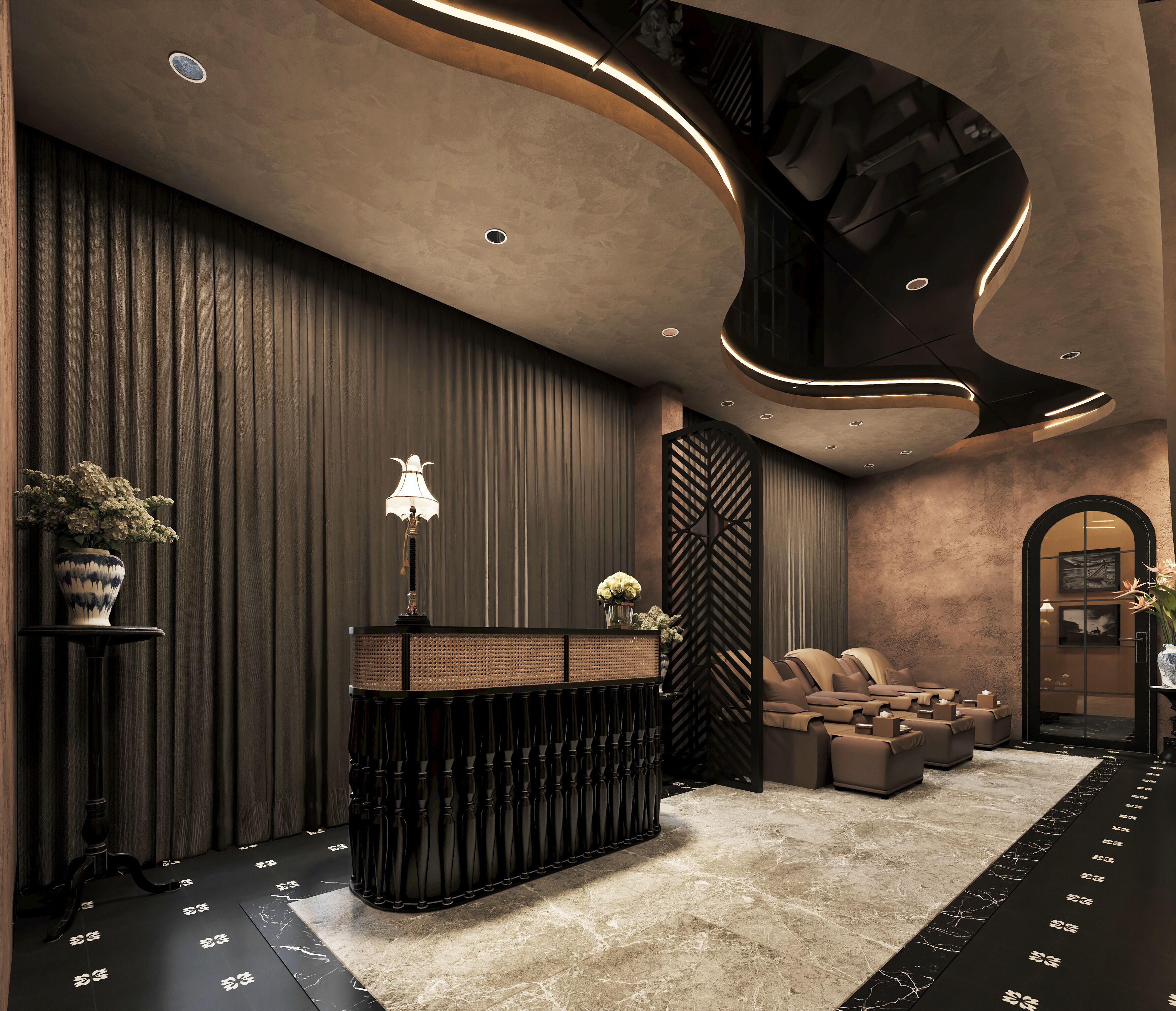 A modern lobby with a reception desk, seating area, and a decorative wall.