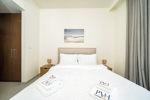 Luxury Apartment, Balcony, City View | Down duvets, in-room safe, blackout curtains, soundproofing