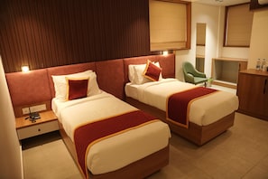 Deluxe Twin Room, Hill View | In-room safe, desk, laptop workspace, blackout curtains