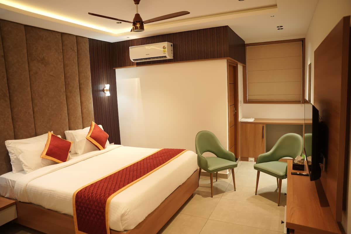 Deluxe Double Room, Hill View | In-room safe, desk, laptop workspace, blackout drapes
