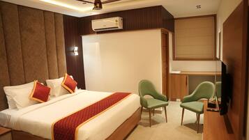Deluxe Double Room, Hill View | In-room safe, desk, laptop workspace, blackout curtains