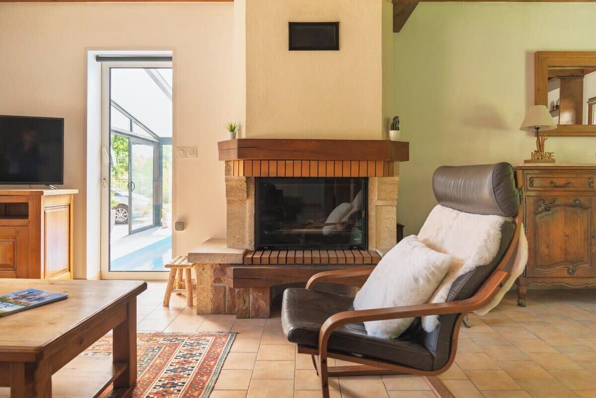 TV, fireplace, books