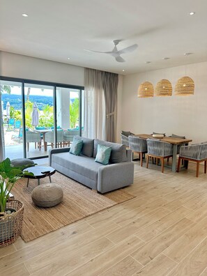 Apartment, 2 Bedrooms, Patio, Beach View | Living area | Flat-screen TV
