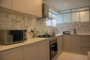 Fridge, microwave, oven, stovetop