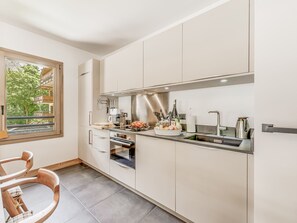 Fridge, microwave, dishwasher, coffee/tea maker