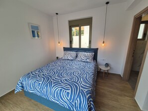 2 bedrooms, in-room safe, iron/ironing board, travel cot