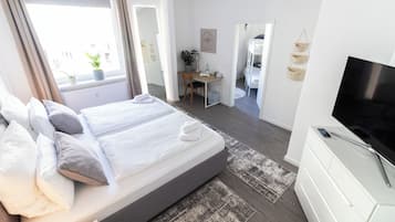 3 habitaciones, caja de seguridad en la habitación y escritorio