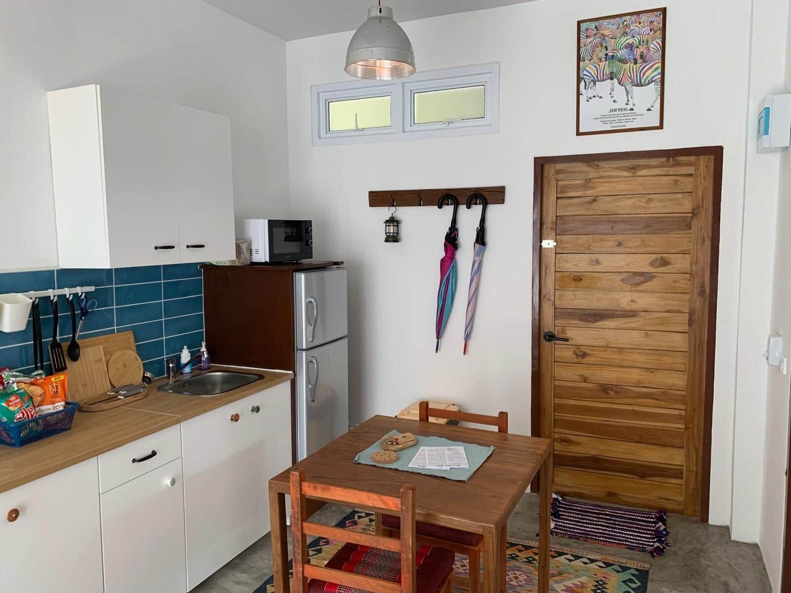 Fridge, microwave, stovetop, coffee/tea maker