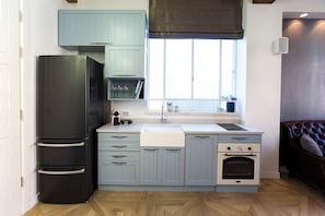 Studio, balkon | Privékeuken