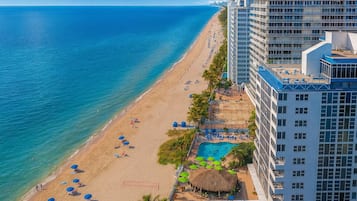 On the beach, sun loungers, beach towels