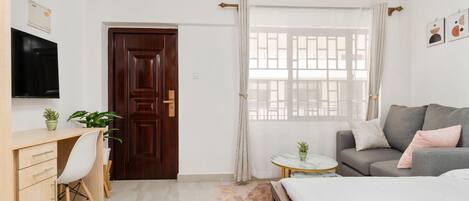 1 غرفة نوم ومكواة/لوح كي وواي فاي وملاءات أسرّة