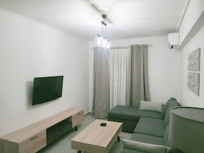 Apartamento, 2 quartos, sacada | Sala de estar