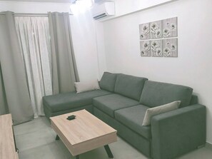 Apartamento, 2 quartos, sacada | Sala de estar