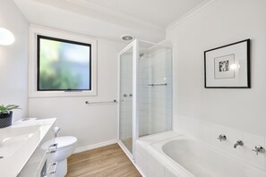 Shower, hair dryer, towels